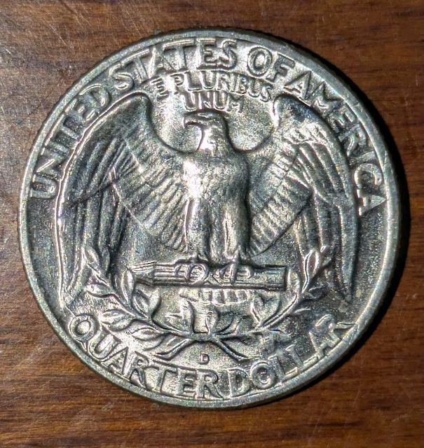 1958 Washington Quarter die chip error showing small raised metal blob on coin surface